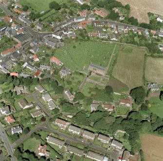 Oblique aerial view of Coldingham centred on the church, taken from the SSE.