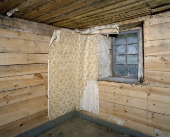 Interior. Central bedroom showing horizontal boardig