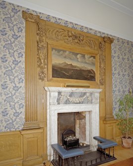 Craigiehall House, Edinburgh. Interior. Detail of white marble fireplace if Blue Room showing carved wooden surround.