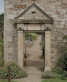 North east gateway, view of doorway with pediment from west (door open).