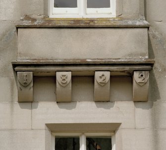 Detail of 1822 date on corbels supporting balcony on south face.