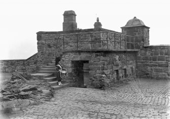 Historic photograph.
View showing Forewall Battery with drummer.
Mount signed; 'Thomas Ross' inscribed: 'Edinburgh Castle.  December 1912.'