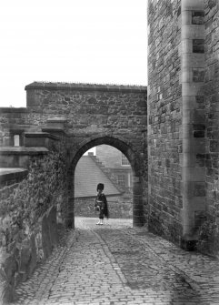 Historic photograph.
View of gate with soldier.
Mount signed 'Thomas Ross' inscribed: 'Edinburgh Castle. December 1912.'