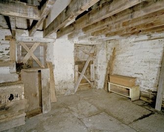 Interior. Ground floor. Storage room (N central room). View from NE looking towards exterir door.