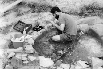 Excavation photographs: Working shot at Old Caerlaverock Castle.