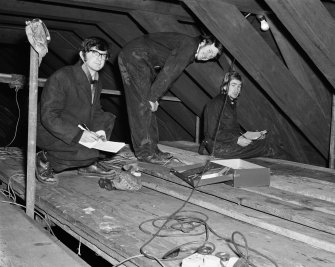 Geoffrey Stell, Duncan Peat and Alan Leith surveying in the roof of Glasgow Cathedral