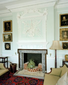 Ground floor, dining-room, interior view of fireplace and overmantle