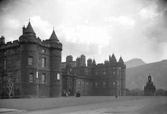 General view of main entrance front to Holyrood Palace, showing wooden scaffolding beside James IV's Tower section
