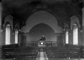 Edinburgh, Gorgie Road, Salvation Army Hall, interior.
General view down the aisle with a preacher in the pulpit.