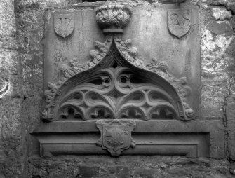 View of sculptured details dated 1728 of a niche head inserted in the back of a garden seat at Grange Loan Garage (formerly Bloomsbury Laundry).