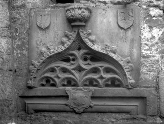 View of sculptured details dated 1728 of a niche head inserted in the back of a garden seat at Grange Loan Garage (formerly Bloomsbury Laundry).