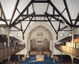 Interior. View from W at gallery level showing chancel