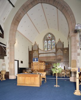 Interior. View of chancel showing communion table, pulpit and organ