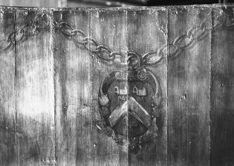 Magdalen Chapel. Interior, detail of insignia of the Saddlers painted on wooden panelling.
