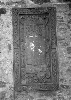 Tombstone in church wall