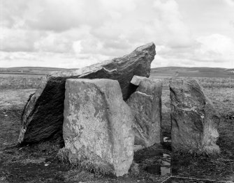 Digital copy of pre-excavation photograph of Dolmen & capstone, from S.W.