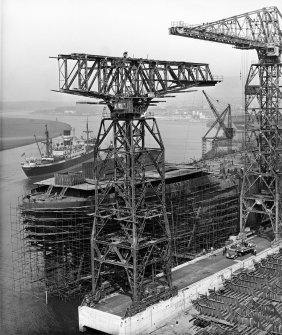 Digital copy of photograph of W Yard, showing Tower Crane 'B' being erected.
John Brown and Co Ltd Engineers and Shipbuilders, Clydebank.
Sir William Arrol Collection Box 16