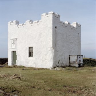 This early example of a lighthouse from 1636 is situated on the highest point of the Isle of May. It is a small square tower with later parapet. View from East.