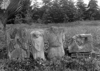Effigies and carved stones at Balmerino Abbey.