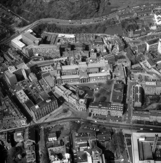 Oblique aerial view of Lauriston Place, showing  Edinburgh College of Art and 3, Lady Lawson Street, Argyle House.
