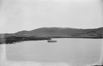 General view looking across loch to dun.