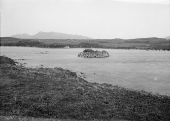 General view across loch to island dun from west.