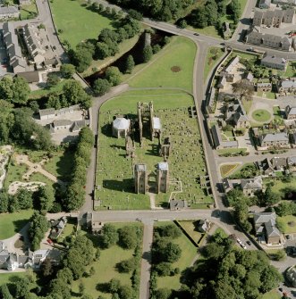Digital copy of oblique aerial view centred on the remains of the cathedral and Chapter House, taken from the W.