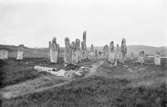 View from south.
Original mounted photograph annotated by Erskine Beveridge ' The Callernish Stones, from S'. 
From the RCAHMS Society of Antiquaries of Scotland Collection MS/36/209.