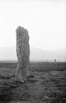 View of standing stone with three others in the distance, Machrie Moor, Arran.
Photographed by Erskine Beveridge in 1884.