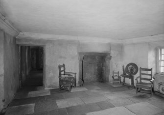 Glasgow, Auchinlea Road, Provan Hall, interior.
View of fireplace, with chairs and spinning wheel.