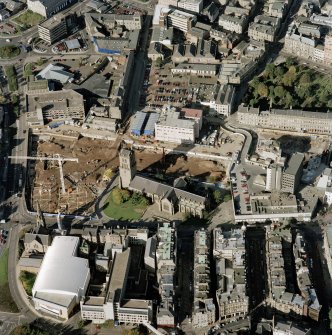 Oblique aerial view centred on the City Churches, Nethergate and adjacent construction, taken from the SE.