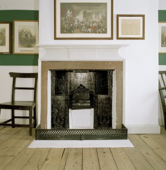 Interior. 1st. floor, S room, detail of fireplace