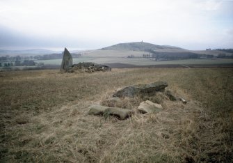 Copy of colour slide (H 93803cs) of view across recumbent stone circle from NE.