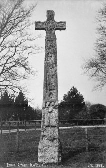 General view of cross taken before removal into Ruthwell Church. Inscribed "Runic Cross. Ruthwell. J.R.1883.".
Copy of vintage photograph on glass.