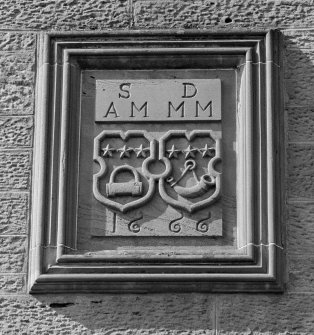 Detail of carved panel in E elevation with initials, symbols and date 1666.
