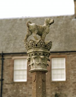 Detail of statue of dog and crown on top of fountain, Drummond Castle.