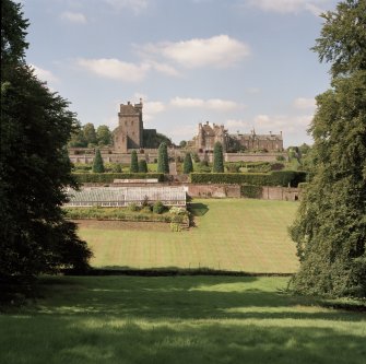 General view of keep, mansion and gardens from South.
