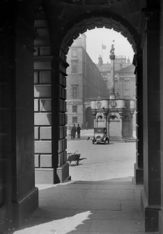 General view of Market Cross through arch in Parliament Square