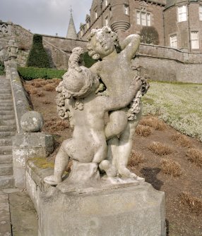 Statue halfway down East side of stone stair (no.12 on plan), view from South West.
