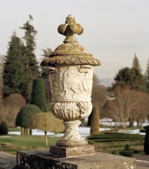 Urn (no.13 on plan) on West side of stone stair, view from North West.
