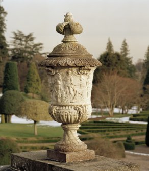 Urn (no.14 on plan) on East side of stone stair, view from North West.