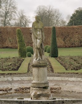 Fountain at West end of garden (no.26 on plan), view of statue and plinth from East.