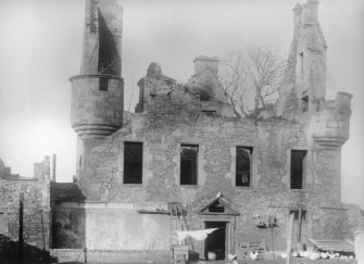 Edinburgh, Granton Castle. View from south, with chickens and washing in courtyard.