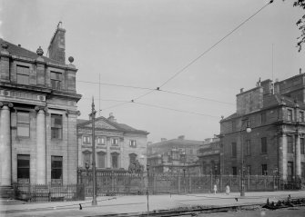 View of front facade and forecourt from North West.