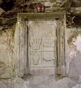 Interior, mural tomb, detail of armorial panel