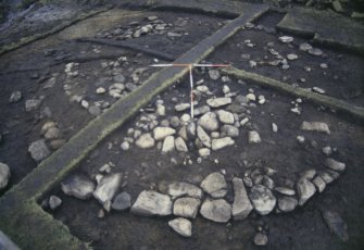 Excavation in progress of a prehistoric kerb cairn at Callanish, Lewis by CFA Archaeology Ltd.