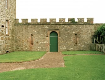 View of wall to east of castle with doorway