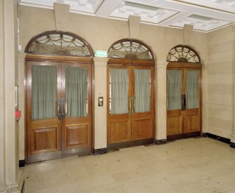 Interior, ground floor, vestibule, view showing triple doors