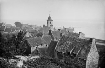 View across Culross from the high path behind the town known as 'the Hanging Gardens'.
Scanned image from original glass plate negative. Original envelope annotated by Erskine Beveridge 'Culross from hanging gdns'.