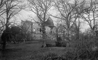 Old Tulliallan Castle
View of castle through trees. 
Scanned from glass plate negative. Original envelope annotated by Erskine Beveridge 'Tulliallan Cas[tle] through trees.